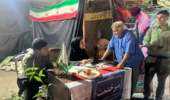 برپایی میز خدمت اداره منابع طبیعی شهرستان رودان و توزیع ۳۰۰ اصله نهال در بین عزاداران حسینی